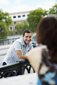 couple flirting on balcony1 - Dating Tips For Men To Relieve Anxiety About Finding a Girlfriend