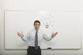 excited man with light bulb - Dream About Failing an Interview Helped Damien Trust Himself (Part 3 of Damien's story)
