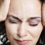 stress women holding head 150x150 - Three Ways to Make Bad Feelings Less Sticky