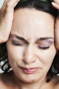 stress women holding head  200x300 - Stress Management Therapy
